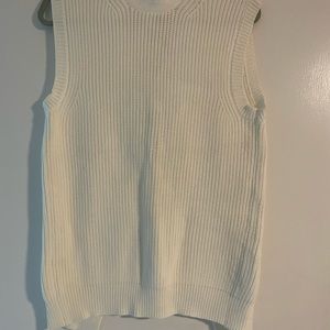 Sleeveless knitted sweater, open at the back, size S, label ALEXANDER WANG.